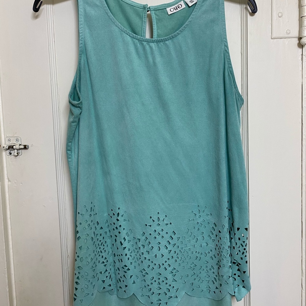 Turquoise tank top with cutouts on trim